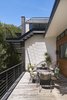 Cantilevered stair to roof deck overlooking patio. Photo 12 of Airole Way Residence modern home