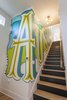 Modern home with Staircase, Metal Railing, and Wood Tread. Unit A - Stairwell - This is the custom mural we had designed for the staircase to keep things interesting but also invite some good ole' Austin charm into the house. Photo 3 of The Reyes Duplex