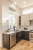 Modern home with Kitchen, Ceramic Tile Backsplashe, Granite Counter, Open Cabinet, Dishwasher, Light Hardwood Floor, Wood Cabinet, Recessed Lighting, Undermount Sink, and Colorful Cabinet. Some cool tile work in Unit B kitchen Photo 5 of The Reyes Duplex
