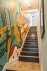 Modern home with Staircase, Metal Railing, and Wood Tread. The mural for Unit B - What would Austin be without music? This semi-hollow body guitar makes sure that music fills the house Photo 7 of The Reyes Duplex