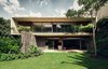 Modern home with Exterior, House Building Type, Concrete Siding Material, Glass Siding Material, and Flat RoofLine. SIERRA LEONA Photo of Sierra Leona