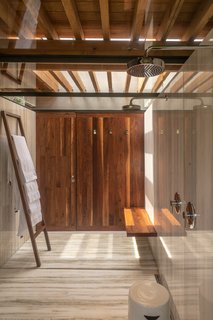 One of the luxurious bathrooms in Casa Santísimo by JJRR Arquitectura. It maintains a sense of natural intimacy despite its open plan and skylight ceiling.