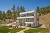 Modern home with Outdoor, Trees, Shrubs, Front Yard, Hardscapes, Grass, Large Patio, Porch, Deck, and Concrete Patio, Porch, Deck. Main House Day Photo 2 of The Tesla of Boulder Homes Offered at $3,950,000