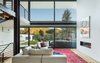 Modern home with Living Room, Sectional, Coffee Tables, Medium Hardwood Floor, and Gas Burning Fireplace. Main House Living Room View Photo 5 of The Tesla of Boulder Homes Offered at $3,950,000