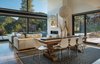 Modern home with Dining Room, Chair, Table, Pendant Lighting, Medium Hardwood Floor, and Gas Burning Fireplace. Main House Dining Room Photo 6 of The Tesla of Boulder Homes Offered at $3,950,000