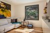 Modern home with Living Room, Sectional, End Tables, and Medium Hardwood Floor. Main House Media Room Photo 9 of The Tesla of Boulder Homes Offered at $3,950,000