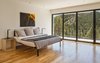 Modern home with Bedroom, Bed, Ceiling Lighting, Medium Hardwood Floor, and Night Stands. Main House Master Bedroom with a View Photo 12 of The Tesla of Boulder Homes Offered at $3,950,000