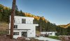 Modern home with Outdoor, Side Yard, Trees, Hardscapes, Shrubs, Boulders, Grass, Landscape Lighting, Large Patio, Porch, Deck, and Concrete Patio, Porch, Deck. Main Unit and Alternate Dwelling Unit Photo 17 of The Tesla of Boulder Homes Offered at $3,950,000