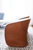 Modern home with Living Room, Chair, Console Tables, Ceiling Lighting, and Medium Hardwood Floor. Living Room Chair Detail Photo 18 of Bahamian Retreat