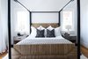 Modern home with Bedroom, Bed, Night Stands, Table Lighting, and Medium Hardwood Floor. Guest Bedroom Photo 10 of Bahamian Retreat