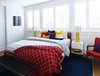 Modern home with Bed, Night Stands, and Medium Hardwood Floor. Guest Bedroom Photo 11 of Bahamas Style