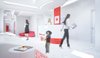 The interior is dominated by white color, as a representation of cleanness. The smooth, curvy entrance hall expands into the waiting room. The red design elements are derived from the two-colored logo of the clinic.
Despite the limitations presented by formerly existed layout, to which the new aesthetics had to be applied, current design came to life as a harmonious piece of its own.
Photo 4 of Kuzanov Clinic modern home