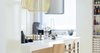 Previously existing walls were brought down, in order to create an open space, unifying a kitchen, a dining room and a living room. Merging aesthetic continues on to the bedroom, where two sinks and the wardrobe become the part of the room, as opposed to traditional approach of keeping them locked away from eye.
The apartment overlooks the city and the mountains, and for the outer visual richness to be fully embraced, the windows were enlarged to the wall scale.
Photo 6 of Double N Residence modern home