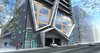 The framework of the apartment building is intercepted by the large, polygon shaped forms. Each one of these massive structures is irregularly angled in relation to the basic structure, giving the exterior more volume and a sense of movement.
The first 4 floors are elongated in the back and are assigned to the garage. This was the fundamental idea, upon which the rest of the space was built.
Photo 4 of R01 Hyper modern home