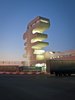 Sarpi border checkpoint is an architectural equivalent of a first impression. As a testament to this building being the entering point to Georgia, shape of the watchtower is inspired by the georgian lettering.
The customs hall for leaving Georgia is located closer to the seaside, than the one for entering the country and The duty free shop resides alongside to it.
The interior design is minimalistic in terms of both, forms and colors, amplifying the focus on functionality.
Architect's note: 'This project came with tight deadline and required meticulously thought-out planning of construction process, as it had to be put to use before the final completion of the building. Implementing interior design was particularly fulfilling experience for me.
My involvement in Sarpi border checkpoint and Mestia Airport projects served as a stepping stone for me, in terms of working independently as an architect and being more audacious in executing my personal architectural concepts that seemed way more challenging before.'
Photo 2 of Sarpi Border Checkpoint modern home