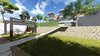 The hillside house for a large family is gracefully flattened out on the landscape. The facade is simultaneously minimalistic and massive, marking the building's modest and strong presence in nature. The multilayered open space in the backside of the house brings an inevitable sense of unexpectedness. The terraces in the garden with lounge areas and The playground carry a cosy vibe.
The pool breaks up the front area into the basketball court and the space for relaxation.
To enhance the idea of the residents being guests to the nature and are also part of it, the entire house is blessed with a mountain view.
Photo 10 of Shifter modern home