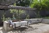 Modern home with Outdoor, Wood Patio, Porch, Deck, Walkways, Grass, Trees, and Hanging Lighting. New outdoor dining space is defined and by a custom concrete and wood bench with steel trellis above . Photo 5 of Garner Pool & Casita