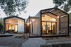 Modern home with Exterior, House Building Type, and Metal Roof Material. Front of house Photo of Glendessary Lane