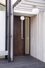 Modern home with Exterior and House Building Type. main entry-custom burnt cedar door Photo 2 of Glendessary Lane