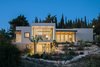 Modern home with Outdoor, Metal Patio, Porch, Deck, Stone Fences, Wall, Decking Patio, Porch, Deck, Pavers Patio, Porch, Deck, Stone Patio, Porch, Deck, Concrete Patio, Porch, Deck, Grass, Metal Fences, Wall, Wood Fences, Wall, Side Yard, Landscape Lighting, Wood Patio, Porch, Deck, Slope, Garden, Back Yard, and Concrete Fences, Wall. Ravit Dvir Architecture and Design Photo of The house in Mei Ami