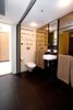open bathroom (shower behind mirror is enclosed when doors are closed) Photo 4 of Terrace House 1 modern home