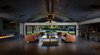 Living room opens to reveal spacious backyard. Photo of Malibu Lake House modern home