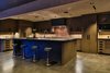 Open kitchen for entertaining. Photo 7 of Malibu Lake House modern home