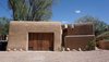 Modern home with Exterior, House, Stucco Siding Material, and Wood Siding Material. Front Street View Photo 6 of Santa Fe East Side Home