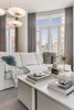 Modern home with Living Room, Sofa, Sectional, Ottomans, Coffee Tables, and Ceiling Lighting. Living Room Photo 4 of Battery Park City Residence