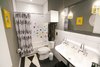 Kohler Brockway sink sets the tone for the boys' bathroom Photo 5 of The Sangar House modern home