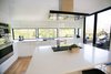 Modern kitchen with 180 degree views of the trees and Geist Reservoir Photo 6 of The Sangar House modern home