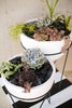 Front porch planters with mid-century modern inspired chevron base Photo 14 of The Sangar House modern home