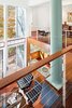 Modern home with Hallway, Medium Hardwood Floor, and Concrete Floor. 2nd Floor Balcony Photo of Home for Sale: Takoma Park House
