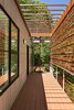 Modern home with Outdoor, Rooftop, Wood Patio, Porch, Deck, Decking Patio, Porch, Deck, Wood Fences, Wall, Horizontal Fences, Wall, and Post Lighting. 2nd Floor deck Photo 10 of Home for Sale: Takoma Park House