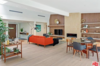 Love the walnut wrapped bookshelves, and the original tile on the fireplace. That smoked glass vintage dining table and Eames chairs help finish the Mad Man look.
Photo 4 of Studio City MCM Sleeper modern home