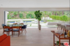 Livning room through slide away glass doors to patio. Indoor/Outdoor living at its best.
Photo 5 of Studio City MCM Sleeper modern home