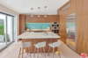 Kitchen with more rich walnut, and that teal tile !! love it
Photo 6 of Studio City MCM Sleeper modern home