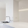 Modern home with Kitchen, Light Hardwood Floor, Refrigerator, Dishwasher, Drop In Sink, Wall Oven, Laminate Cabinet, Ceramic Tile Backsplashe, Microwave, Granite Counter, and Ceiling Lighting. 038.PEDRO RICO - Kitchen detail Photo 3 of 038.PEDRO RICO