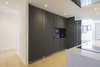 Modern home with Kitchen, Light Hardwood Floor, Granite Counter, Microwave, Ceramic Tile Backsplashe, Dishwasher, Drop In Sink, Refrigerator, Laminate Cabinet, Ceiling Lighting, and Wall Oven. 038.PEDRO RICO - Kitchen Photo 11 of 038.PEDRO RICO