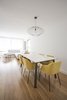 Modern home with Dining Room, Table, Light Hardwood Floor, Lamps, Chair, and Ceiling Lighting. Dinning room Photo 3 of 010.MS51