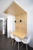 Modern home with Kitchen, Wood Backsplashe, Microwave, Porcelain Tile Floor, Wood Counter, Wall Oven, Refrigerator, Pendant Lighting, and White Cabinet. Kitchen Photo 10 of 010.MS51