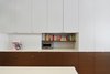 Modern home with Kitchen, White Cabinet, Engineered Quartz Counter, and Wood Cabinet. Kitchen detail Photo 3 of Tribeca Loft