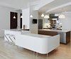 Modern home with Kitchen, Range, Refrigerator, Dishwasher, Wood Cabinet, Range Hood, Engineered Quartz Counter, White Cabinet, Metal Backsplashe, Ceiling Lighting, Undermount Sink, Recessed Lighting, Pendant Lighting, and Light Hardwood Floor. Kitchen and integrated banquette Photo 6 of Tribeca Loft