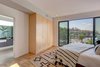 Modern home with Bedroom and Light Hardwood Floor. Amazing Master bedroom Photo 4 of Sunset Drive - Franklin Hills/Silver Lake