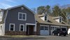 Modern home with Outdoor and Front Yard. Front of the house with 4 car garage. Photo of Barn House