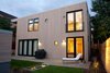 Modern home with Outdoor, Back Yard, Hardscapes, Small Pools, Tubs, Shower, Walkways, Trees, Concrete Patio, Porch, Deck, Stone Patio, Porch, Deck, Horizontal Fences, Wall, and Landscape Lighting. Rear Elevation. Bluestain pine siding. Photo 5 of The Huff Residence
