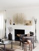 Modern home with Living Room, Coffee Tables, Light Hardwood Floor, Chair, Ceiling Lighting, and Wood Burning Fireplace. Living Room Fireplace Photo 8 of Artist Residence