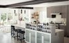 Modern home with Kitchen, Wood Cabinet, Light Hardwood Floor, Metal Backsplashe, Engineered Quartz Counter, Undermount Sink, Ceiling Lighting, and Range. Kitchen with exposed steel beams. Cabinets by Kabi. Photo 5 of Artist Residence