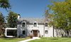 Modern home with Outdoor, Front Yard, Trees, and Small Patio, Porch, Deck. Front Elevation with Master Suite Addition to Left and Garage with Rooftop Deck to Right. Photo 2 of Artist Residence