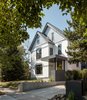 Modern home with Exterior, House Building Type, Metal Roof Material, and Brick Siding Material. Front of home with new cantilevered front entry canopy. Photo 14 of Thole Residence